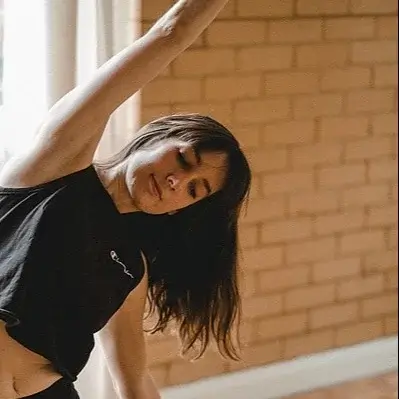 A woman practising yoga.